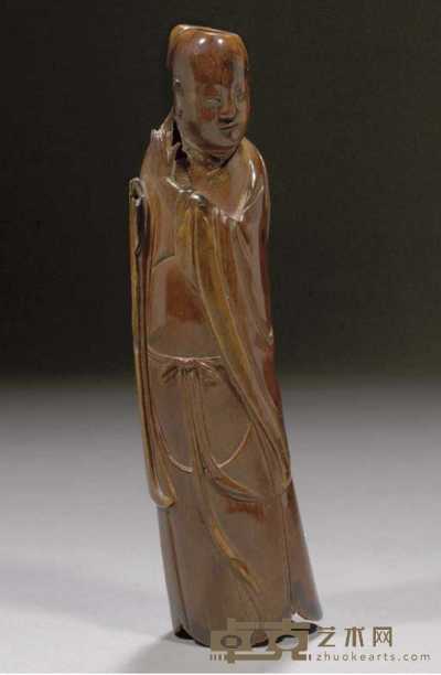 Ming dynasty A stained ivory figure of an immortal 
